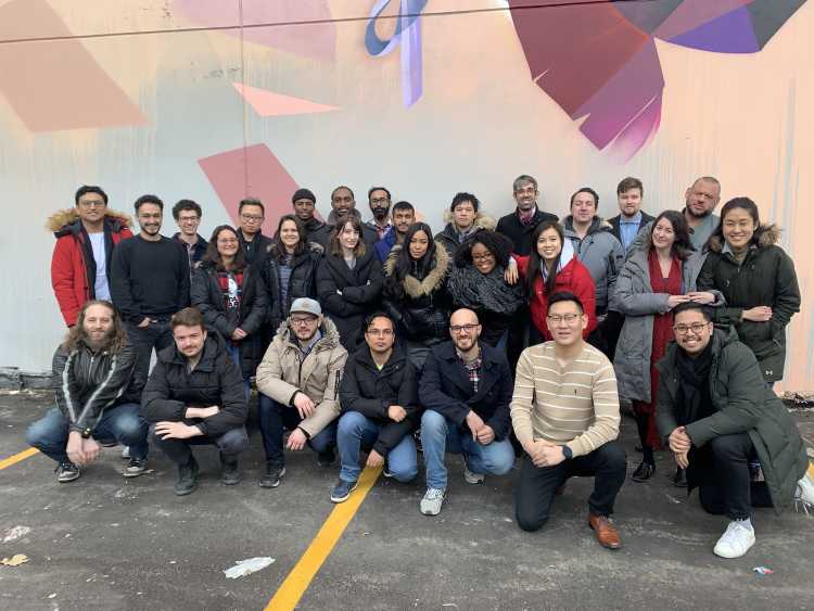 Quantum Mob team smiling together